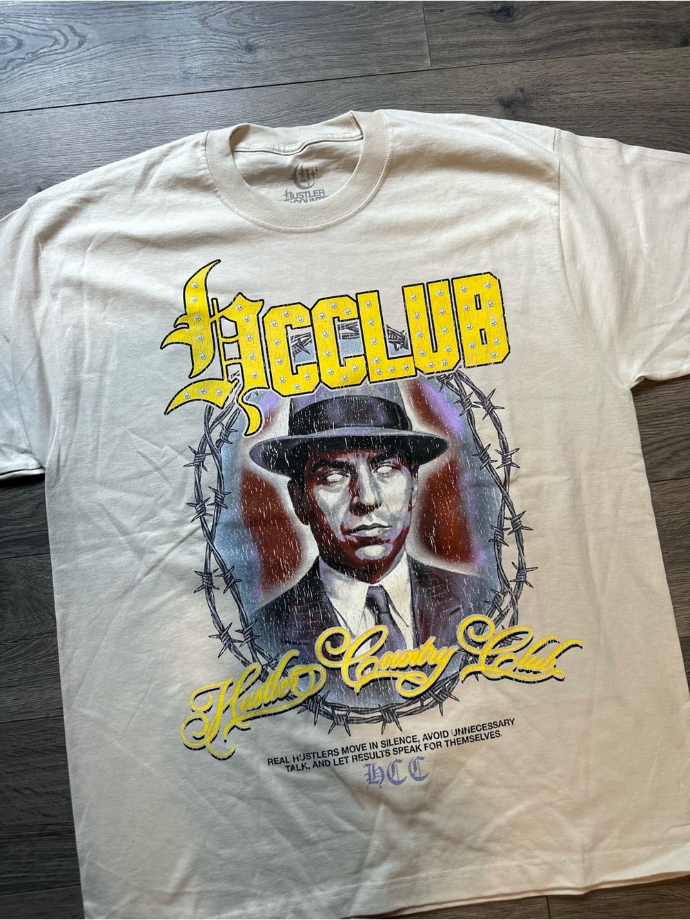 Hustlers country club White Graphic Tee with Yellow Accents
